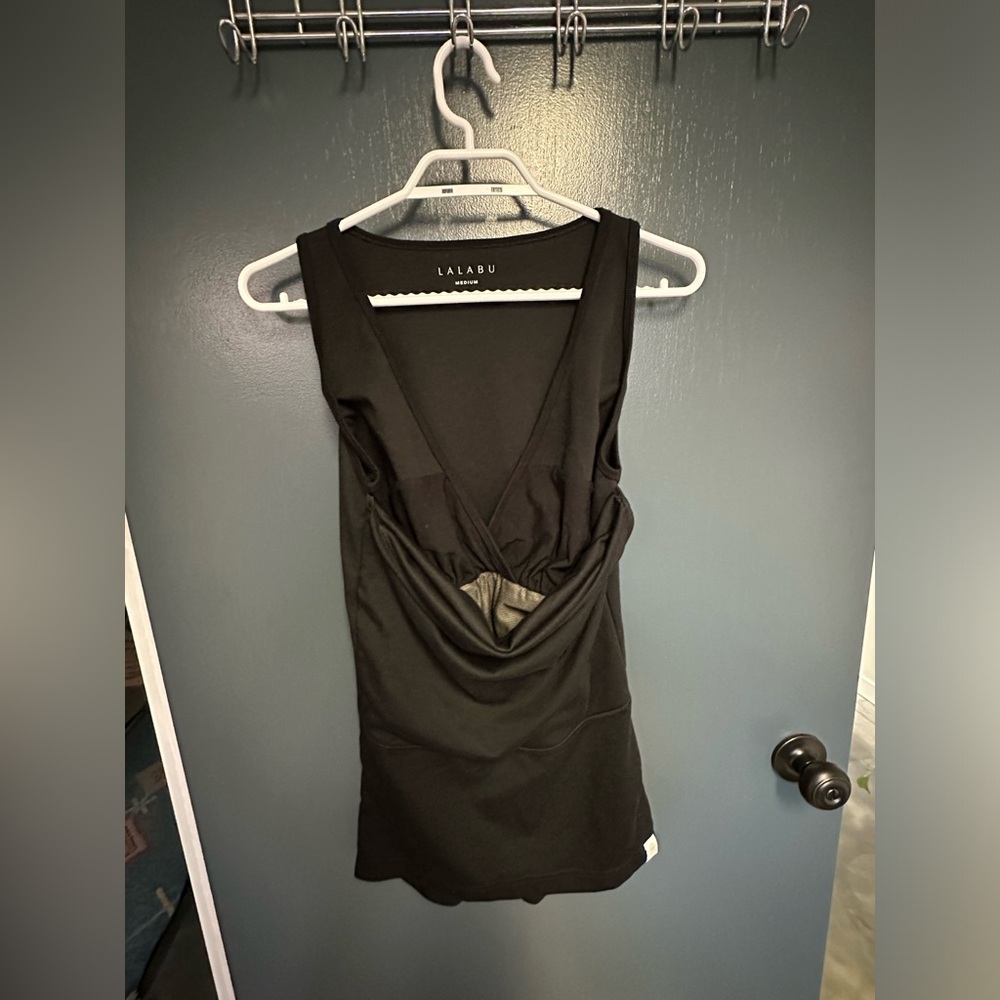 Lalabu baby wearing shirt